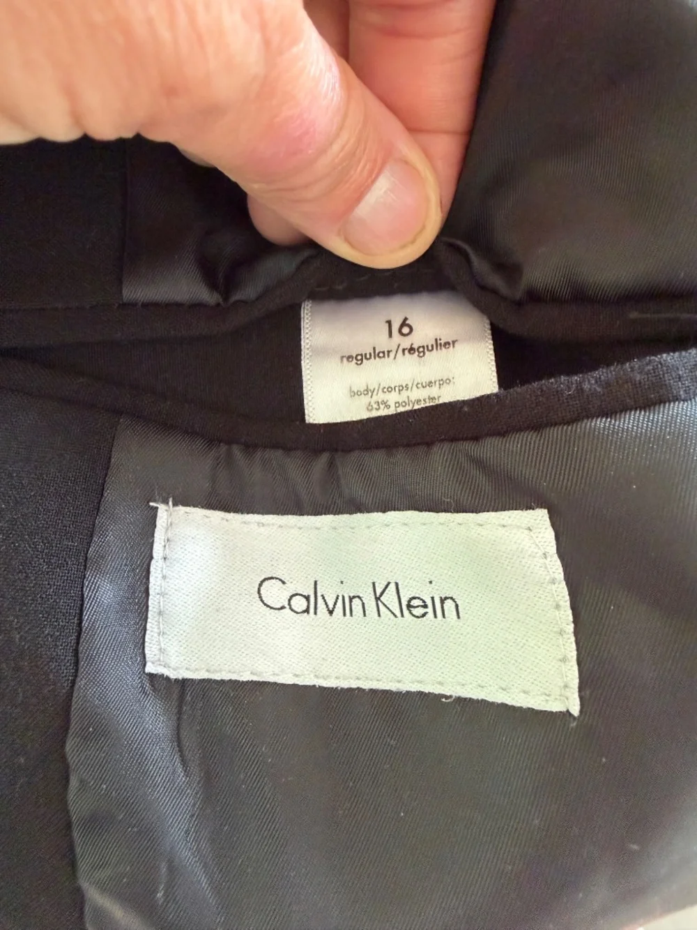 Boy’s size 16 Calvin Klein black suit with white shirt